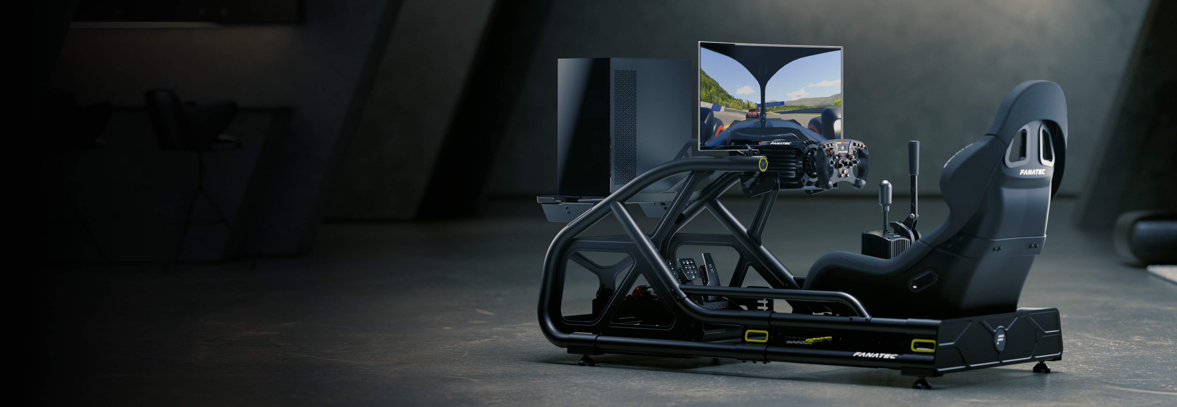 Fanatec sim racing setup with a Direct Drive Wheel Base, steering wheel and pedals mounted in a cockpit