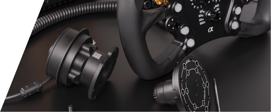 Cable management and mounting detail on a Fanatec sim racing cockpit